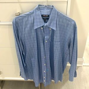This is a Kirkland light blue dress shirt, size 17 1/2 X 3 2–33